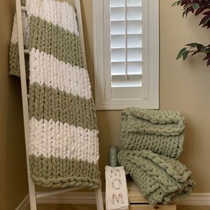 Evergreen forever large handmade chunky knit blanket in sage and white.